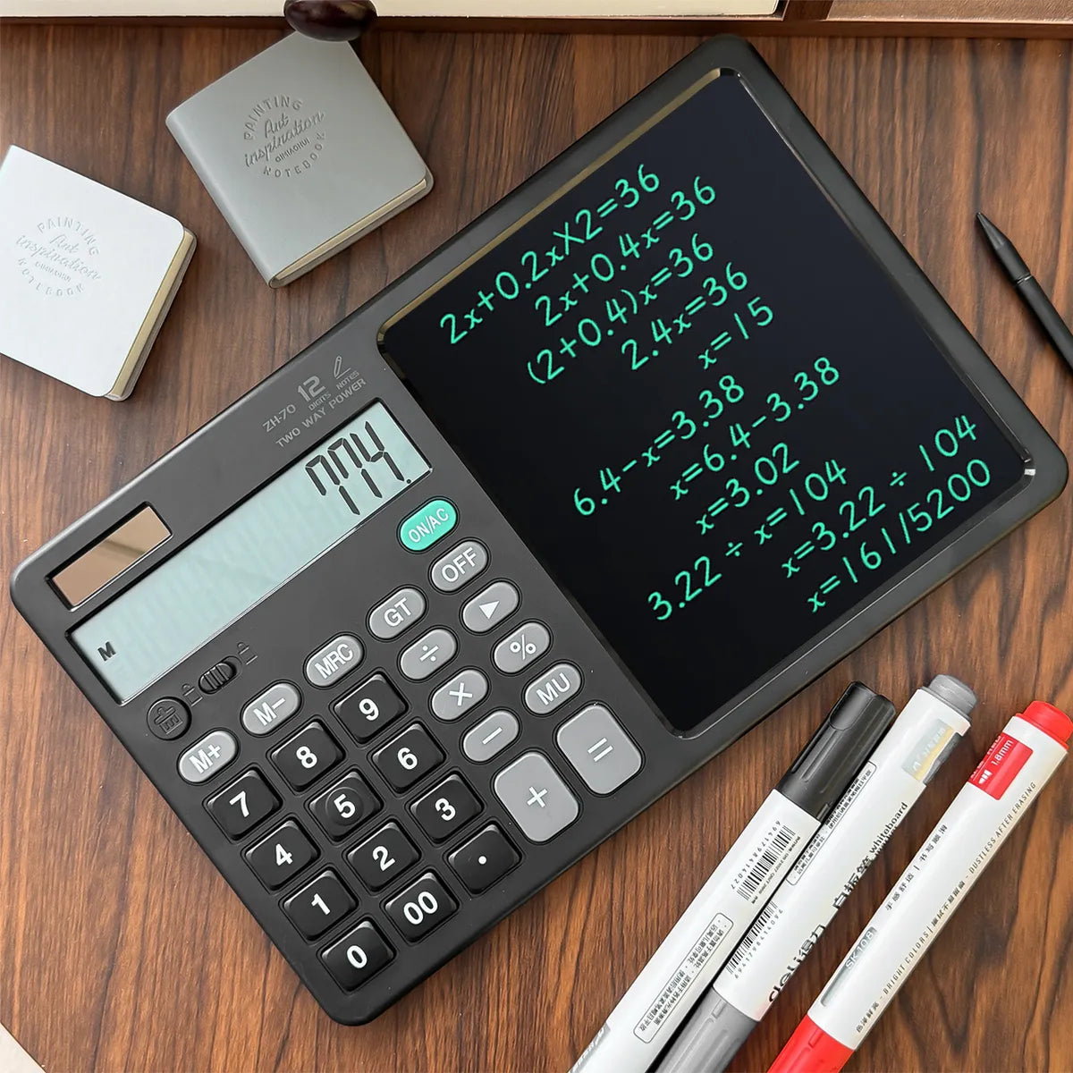 آلة حاسبة علمية مع جهاز لوحي للكتابة